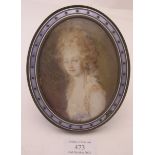 An oval enamelled frame inset with painting of a Georgian lady, approx 6" x 5". Condition report: