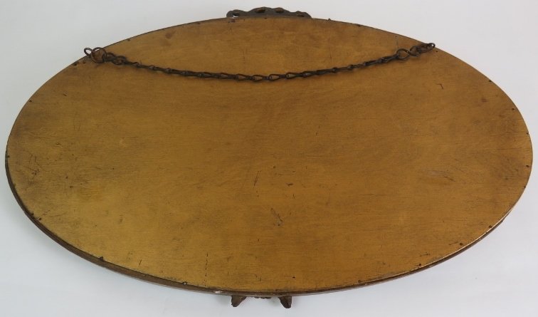 An oval early 20th Century Barbola mirror with floral moulding and bevelled glass. Width 60cm. - Image 4 of 4
