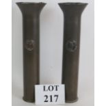 A pair of pre WW2 Trench Art shell vases date 1936 and 1938 and both bearing the badge of The
