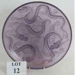 A 1930s Art Deco Barolac moulded lilac glass dragon bowl designed by Josef Inwald. Diameter 35.