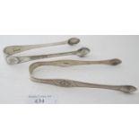 Two pairs of Georgian bright cut silver sugar tongs, Peter & Ann Bateman and George Day. Approx