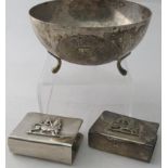 Two white metal matchbox holders, possibly Ethiopian with the Lion of Judah applied on the side, and