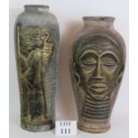 Two large mid-century Ethnic pottery vases, one with an African mask relief the other with an