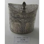 A silver continental trinket box with embossed panels depicting figures and animals. Import marks