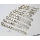 A set of 6 silver pistol handled knives & forks, Sheffield 1903, 1904, 1905, James Dixon, shell