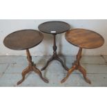 A trio of Edwardian mahogany circular tripod wine tables. 50cm high x 30cm wide x 30cm deep (