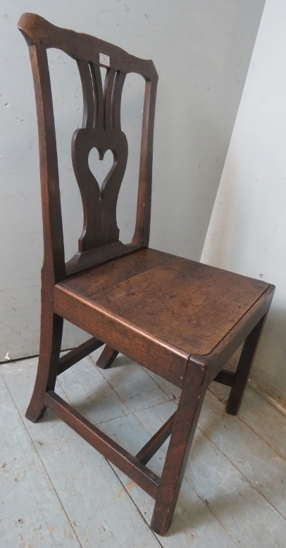 An 18th century oak hall chair with a shaped & pierced back splat depicting a love heart, possibly - Image 2 of 3