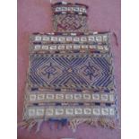 An antique Afghan salt/saddle bag. Condition report: In good condition.