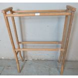 A vintage pine double towel rail. 87cm high x 64cm wide x 22cm deep (approx).