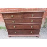 An Edwardian Regency revival mahogany chest of two short over three long graduated drawers with