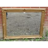 A vintage rectangular over mantle mirror in an ornate gesso frame. 82cm high x 107cm wide x 8cm deep