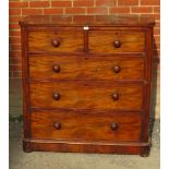 A Victorian mahogany chest of drawers, two short over three long graduated cock beaded drawers, with