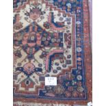 A late 19th Century Persian rug of character. 118cm x 203cm. Condition report: Some wear to ends.