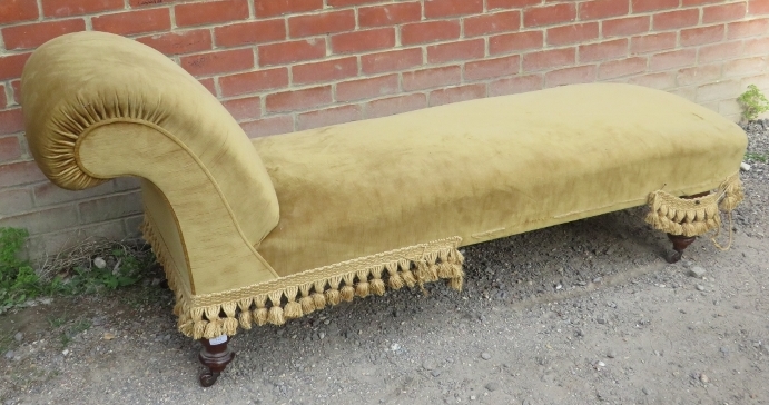 A 19th century chaise longue upholstered in gold draylon, raised on tapering turned supports with - Image 2 of 2