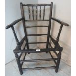 A 19th century Sussex armchair in the manner of William Morris, in need of re-caning. 83cm high x