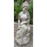 A reconstituted stone classical Grecian nude. 60cm high x 25cm wide x 30cm deep (approx).