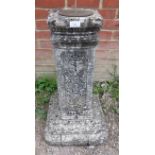 A reconstituted stone sundial on a decorative square plinth. 77cm high x 37cm wide x 37cm deep (
