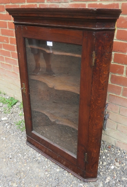 A 19th century oak wall hanging glazed corner cupboard with three shaped shelves. 102cm high x - Image 2 of 2