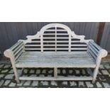 A nicely weathered teak Lutyens style garden bench.