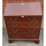 A 19th century mahogany bureau of small proportions, the fitted interior with central document safe,