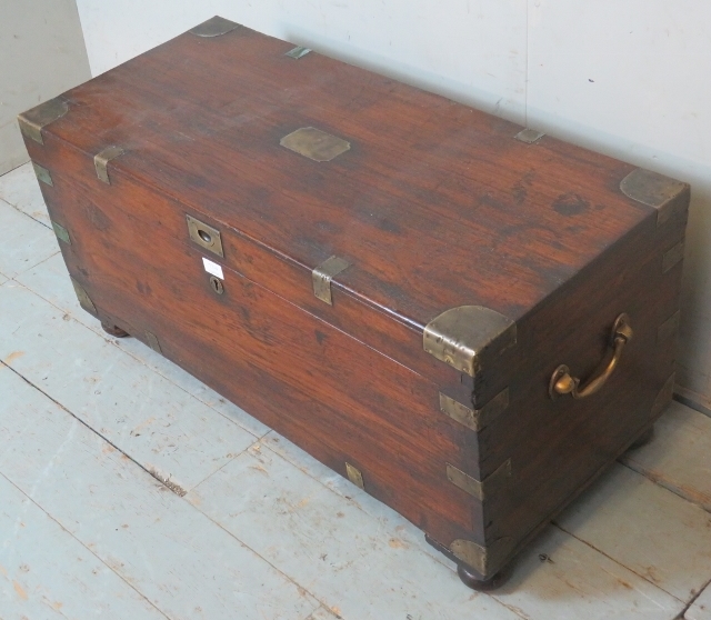 A 19th century oak brass bound campaign chest with internal candle holder box, raised on bun feet. - Image 2 of 3