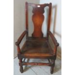 An early 18th century oak carver hall chair of excellent colour and patina. 114cm high x 60cm wide x