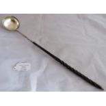 A Georgian 18th century silver toddy ladle with baleen (whale bone) twist handle, London 1783, maker