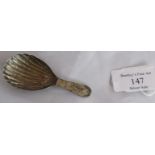 An early C19th Irish silver caddy spoon with scallop shell bowl. Dublin 1821, maker William Osborne.