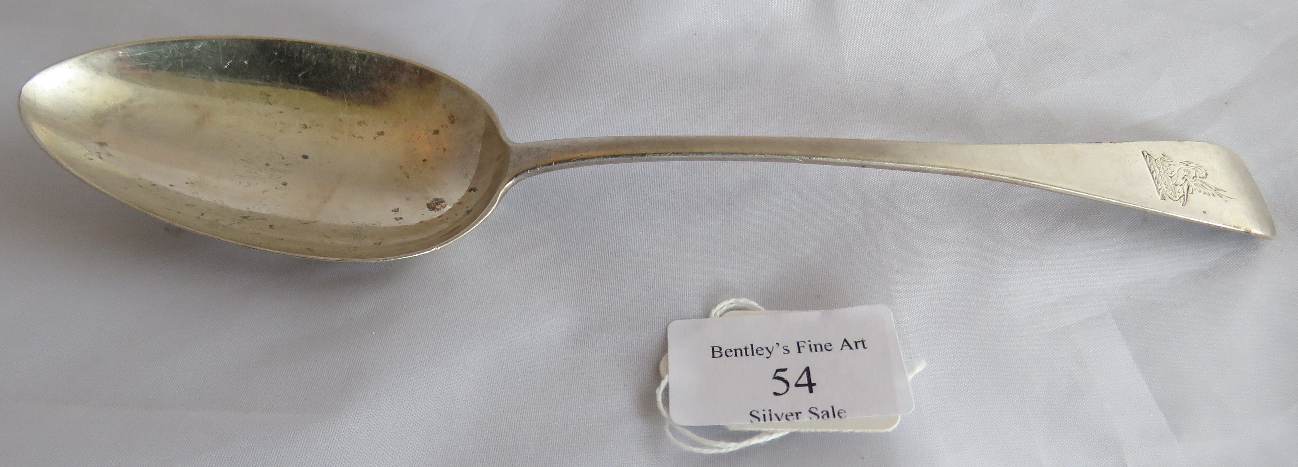 A Georgian silver tablespoon, London 1828, maker John Meek. Weight 58 grams, measures 9 inches long.