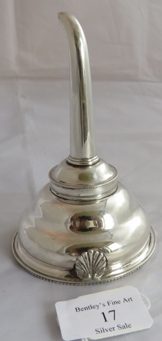 An C18th silver wine funnel. Top marked London 1783, maker Robert Hennell. Base unmarked. Total