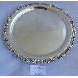 An antique silver card tray with acanthus leaf decorated rim. Hallmark rubbed and indistince. Weight