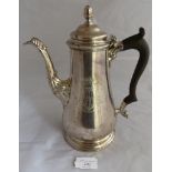 A silver Georgian 18th century coffee pot with wooden handle with coat of arms to body, London 1756,