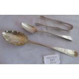 A silver decorative serving spoon, London 1819, maker William Bateman, a silver dessert spoon,