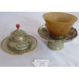 A rare unmarked silver 19th century Tibetan saucer on pedestal base with orange jade cup, also