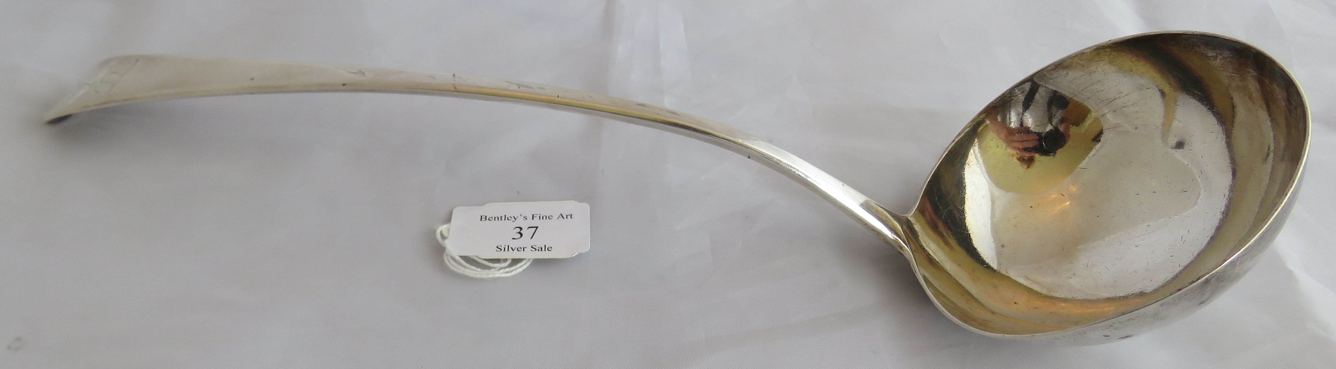 A large silver C18th Georgian soup ladle, London 1796, maker Richard Crossley. Heraldic mark to - Image 2 of 5