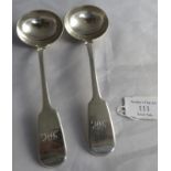 A pair of William IV silver sauce ladles, London 1833, maker William Eaton. Monos to handles.