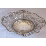 A very fine large Georgian C18th silver basket decorated with grape vines, butterflies and wheat