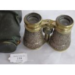 A pair of silver covered binoculars having embossed floral design, Birmingham 1897, silver maker JP,