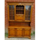 A good quality reproduction solid oak period style wall unit. 198cm high x 135cm wide x 40cm deep (