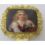 A 19th century gold and Swiss enamel brooch, the rectangular plaque depicting a young girl with