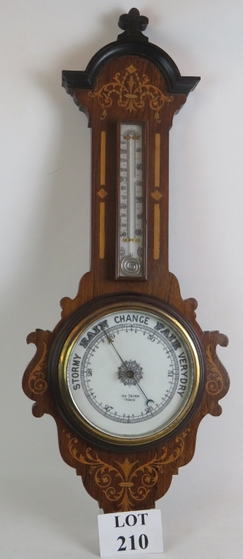 A good quality Edwardian barometer in inlaid mahogany case, signed Thick, Frome. Height 87cm.