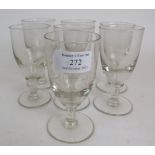Seven Early 19th Century short stem wine glasses each with a bladed knop. Height: 11.5cm.