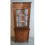 An Edwardian Regency revival inlaid & crossbanded display cabinet with marquetry cornice over an