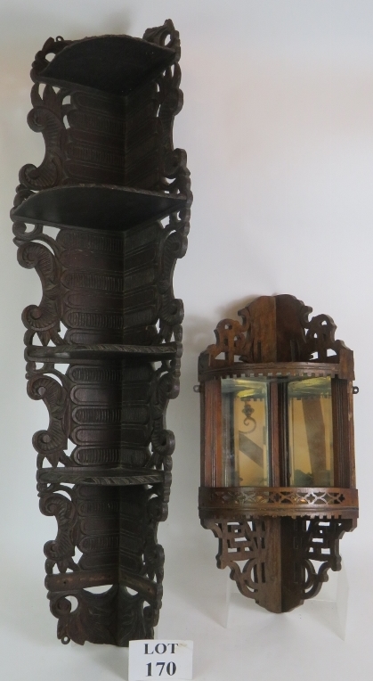 Two sets of antique corner shelves, one with scroll carved sides and shelves, the other with inset