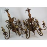 Two gilt metal and wood six branch electric chandeliers, height 70cm. (2). Condition report: Vintage