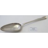 A Georgian silver dessert spoon, lace back decoration, London 1777, approx 2.2 troy oz/68 grams.
