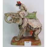 A large Imperial Porcelain Amphora Teplitz figure of an Indian elephant with rider signed Vogl.