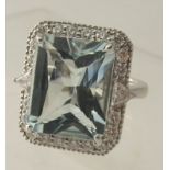 An 18ct white gold large aquamarine & diamond cocktail ring. Aquamarine 7.62cts, diamonds 0.86ct