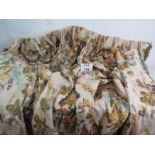 A large pair of good quality fully lined curtains with a pastel floral print. Length 210cm. Width