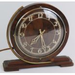 A 20th Century Art Deco Ferranti electric mantel clock in oak case. Height 20.5cm. Condition report: